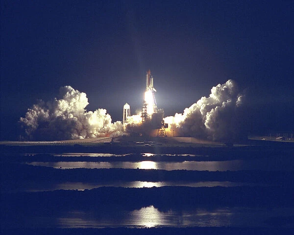 STS-86 Launch. The Space Shuttle Atlantis blazes through the night sky