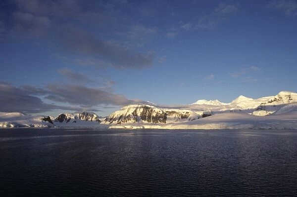 Rugged, rocky montainous coast along the Neumayer Channel. Neumayer Channel. Antarctica