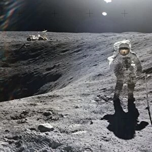 APOLLO 16, 1972. Astronaut Charles M. Duke collecting lunar samples at the rim of Plum Crater during the Apollo 16 mission, 21 April 1972. Photographed by astronaut John Young