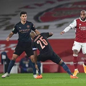 Arsenal's Lacazette Outmaneuvers Manchester City's Fernandinho in Carabao Cup Clash