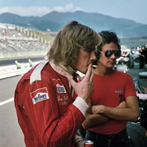 1976 Japanese Grand Prix: James Hunt with 500cc motorcycle rider Barry Sheene, portrait